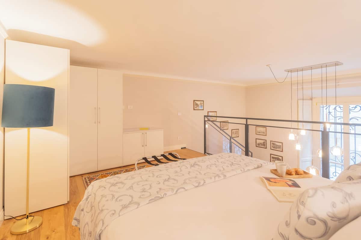 1 bedroom, laptop workspace, iron/ironing board, bed sheets