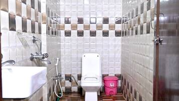Family Studio, Garden View | Bathroom | Shower, rainfall showerhead, towels, toilet paper