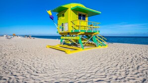 A lifeguard tower on a beach with clear skies. - Two Bedroom Suites South Beach (Miami Beach)
