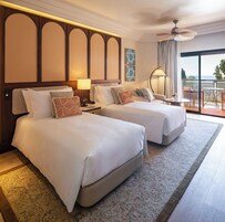 Deluxe Twin Room, Sea View | Hypo-allergenic bedding, minibar, desk, laptop workspace
