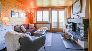 Basic Apartment | Living area | TV, fireplace - Chez Eddy (Bettmeralp)