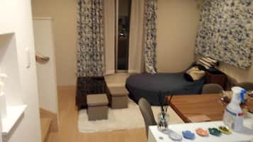 Habitación doble, vistas a la ciudad | Zona de estar