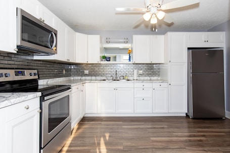 Fridge, microwave, oven, stovetop. Upgraded Downtown Sandusky Apartment - Sleeps 5!
