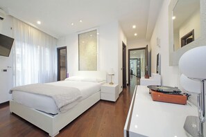 2 slaapkamers, een strijkplank/strijkijzer, gratis wifi, beddengoed