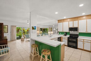 Coffee/tea maker, fridge, microwave, oven