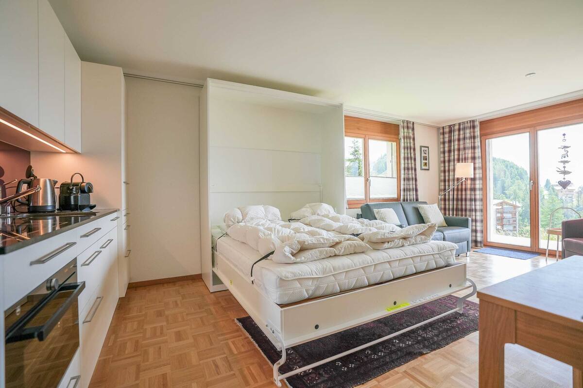 Eenvoudige studio (Casa Arturo 114) | Een laptopwerkplek, beddengoed