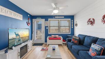 Condo, Patio, Pool View | Living area | 40-inch Smart TV with cable channels