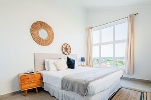 1 bedroom, desk, iron/ironing board, travel crib