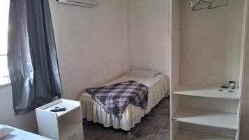 Quarto triplo família | Frigobar (abastecido com itens grátis), Wi-Fi de cortesia, roupa de cama