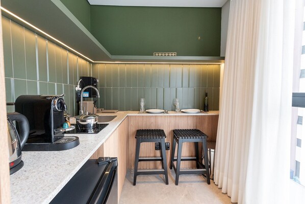 Fridge, microwave, coffee/tea maker, toaster