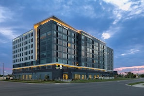 A modern Hyatt Place hotel with a glass facade, multiple floors, and a prominent 'Hyatt Place' sign on the top. - Hyatt Place Mississauga / Airport Corporate Centre (Mississauga)