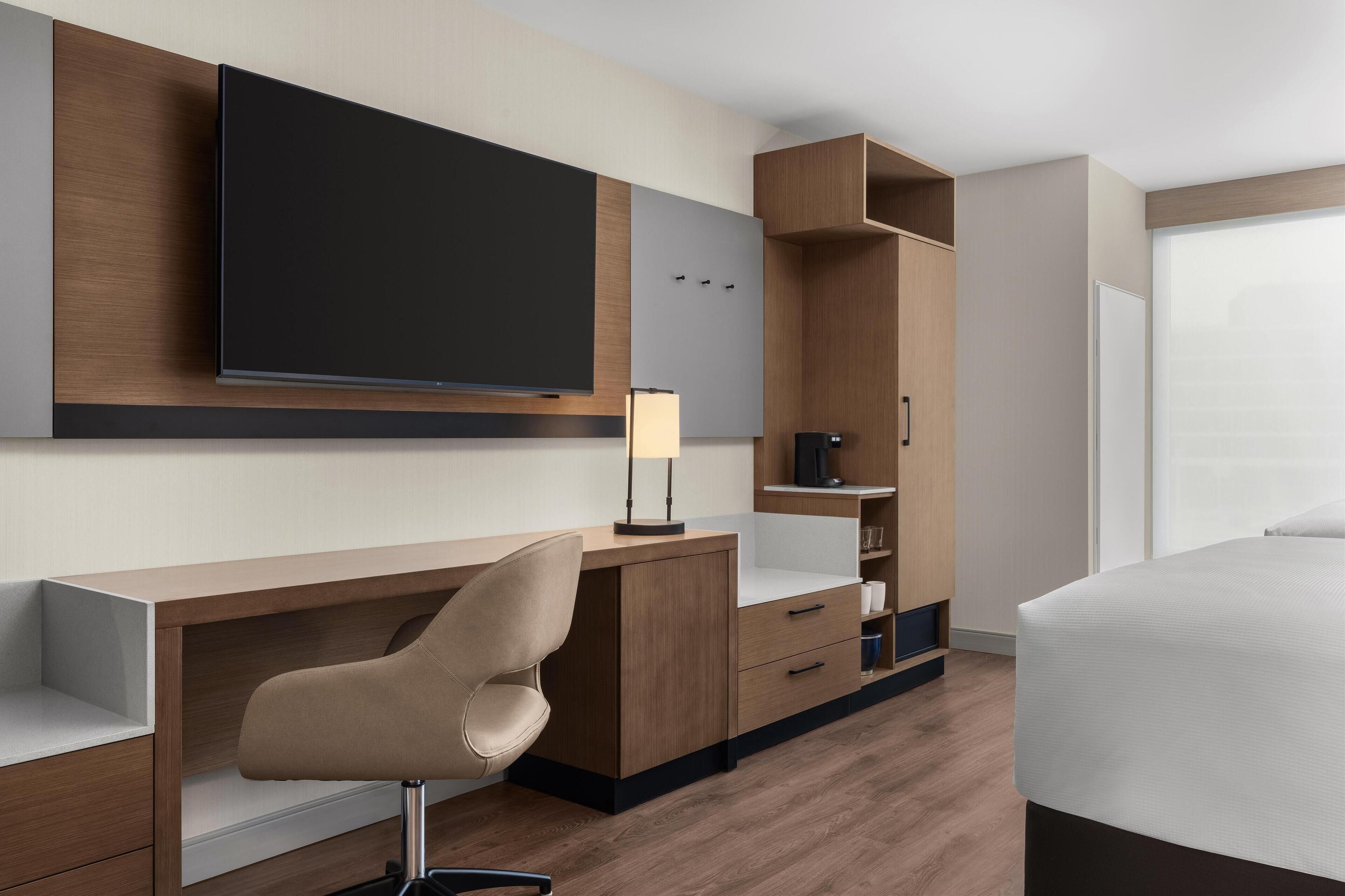 Premium bedding, memory-foam beds, in-room safe, desk