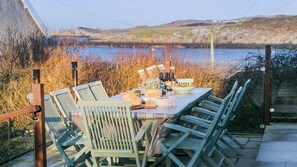 Outdoor dining - Bryn Teg - sleeps 10 guests in 5 bedrooms (Cemaes Bay)