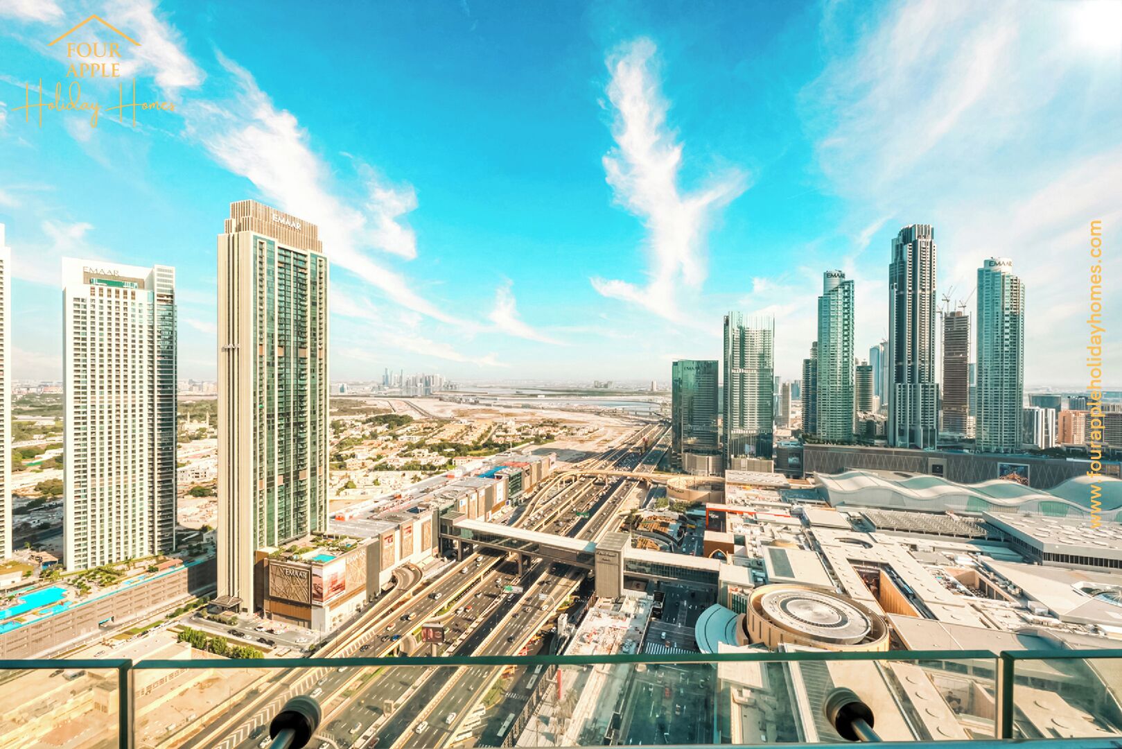 A high-rise hotel with multiple floors, a rooftop pool, and a view of the cityscape.
