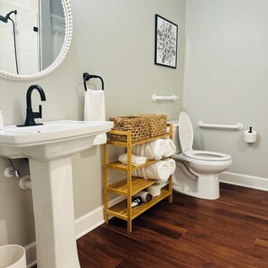 Shower, hair dryer, towels