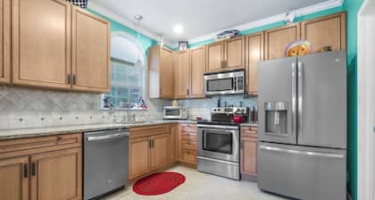 Stylish Home on water, minutes from downtown. Secluded and Convenient to it all!