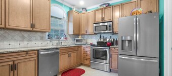 Stylish Home on water, minutes from downtown. Secluded and Convenient to it all!