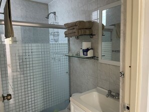 Hair dryer, towels, soap, toilet paper