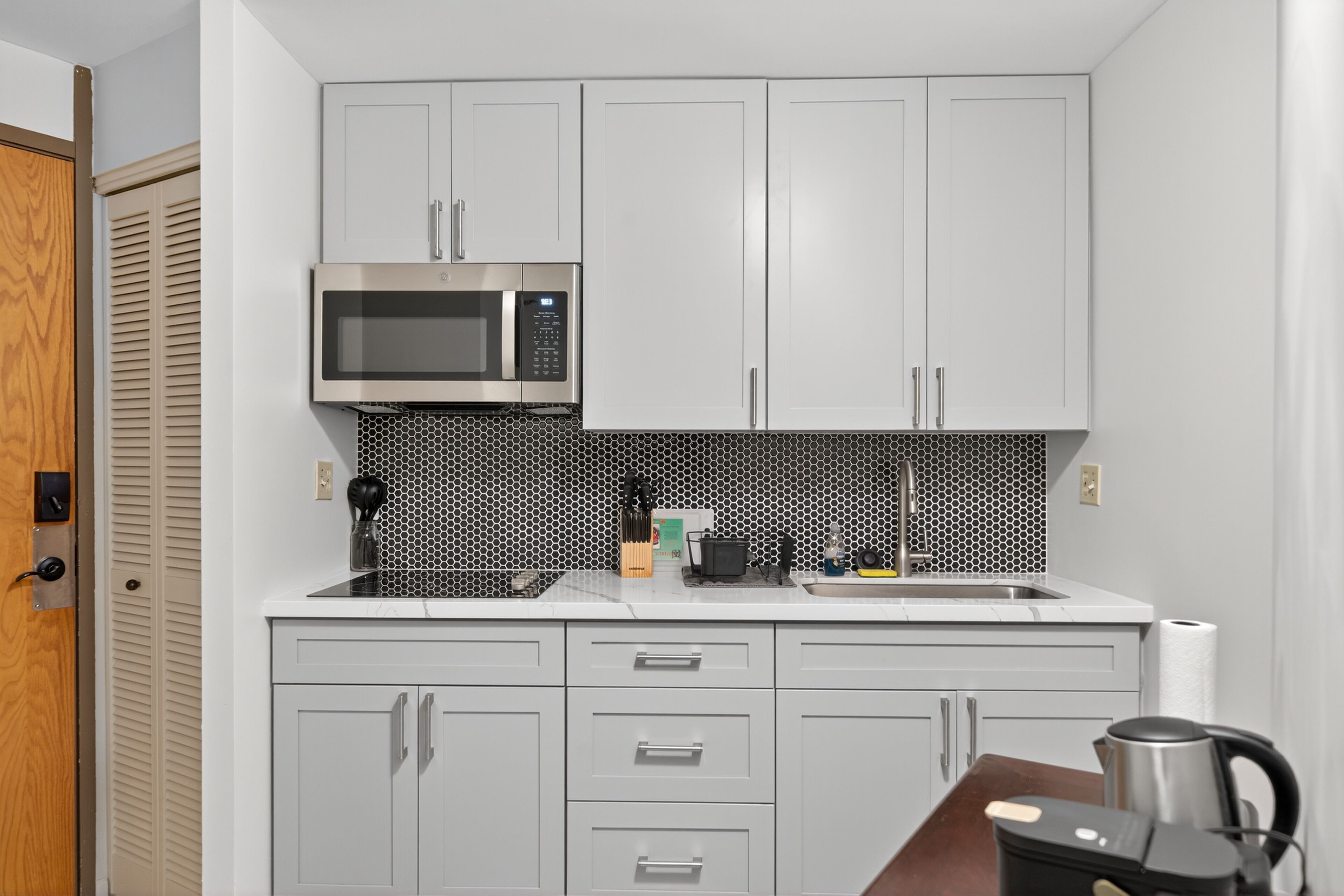 Fridge, microwave, coffee/tea maker, toaster