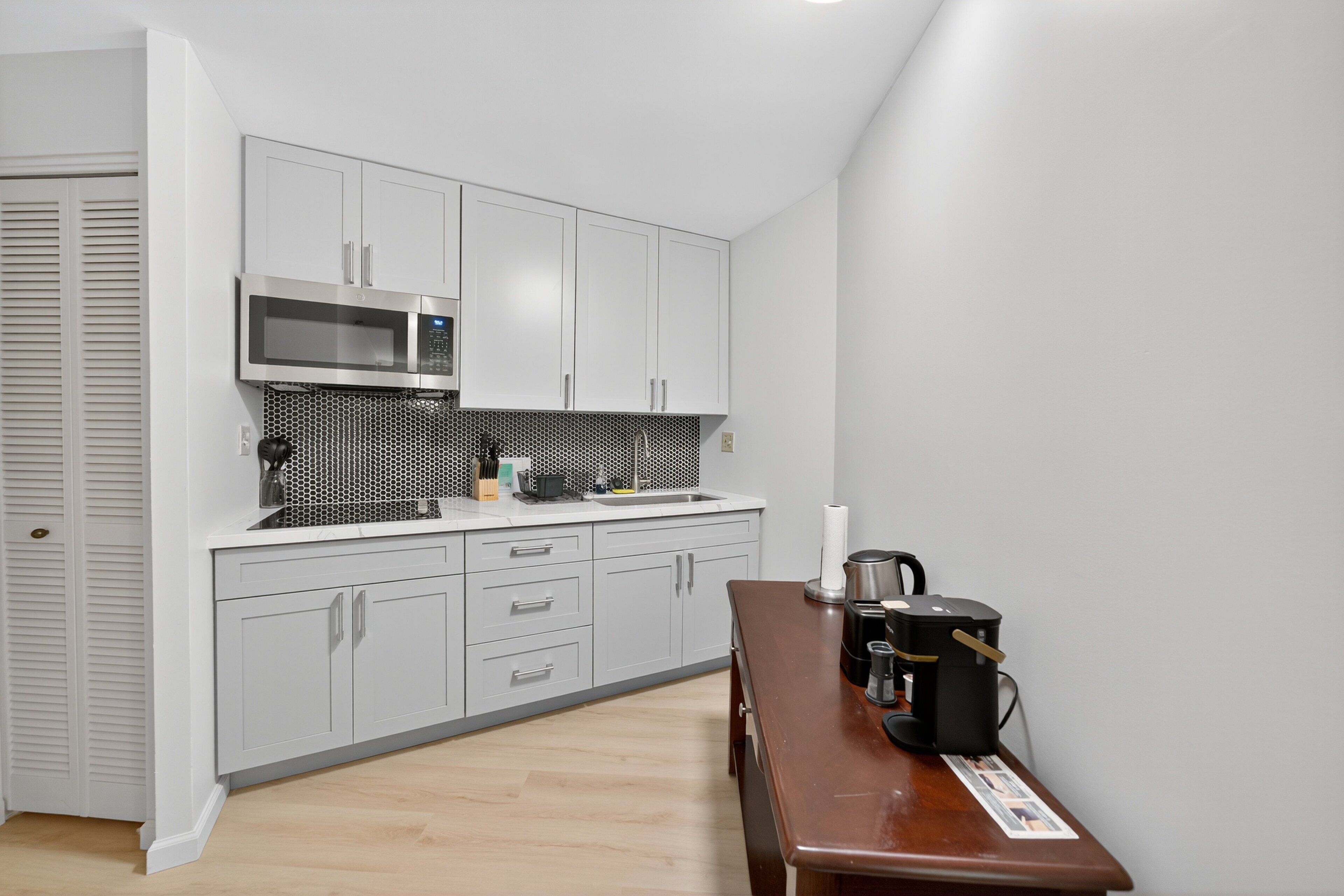 Fridge, microwave, coffee/tea maker, toaster