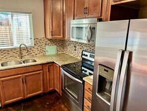 Fridge, microwave, oven, stovetop - Ultimate Furnished Rental-Centrally Located (Aurora)