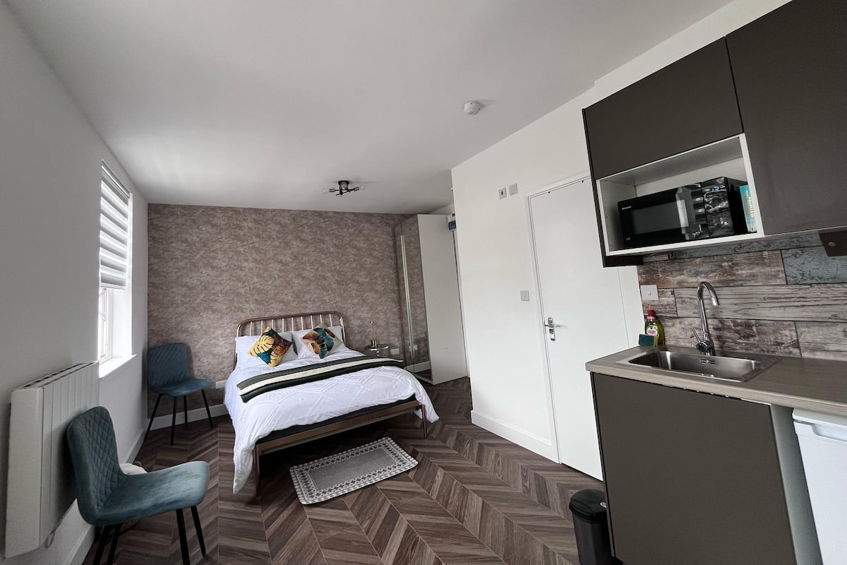 Superior Quad Suite | Een bureau, gratis wifi, beddengoed