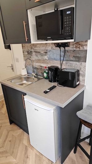 Estúdio clássico, suíte, vista para a cidade | Cozinha privada