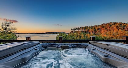 Stunning Mtn Cabin on Lake w/ 2 Stry Dock, Indoor Pool, Hot Tub, and Arcade Room