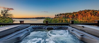Stunning Mtn Cabin on Lake w/ 2 Stry Dock, Indoor Pool, Hot Tub, and Arcade Room