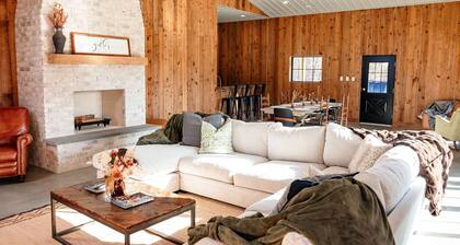 The Greenwood, a modern barndominium. Cozy, spacious, and private
