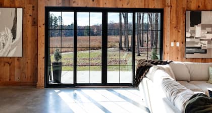 The Greenwood, a modern barndominium. Cozy, spacious, and private
