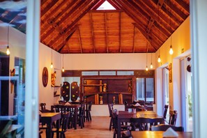 Breakfast, lunch, dinner served; local cuisine 