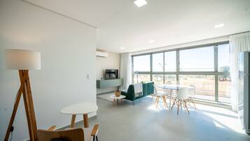 Comfort Apartment, 2 Bedrooms, City View | Living area | Flat-screen TV