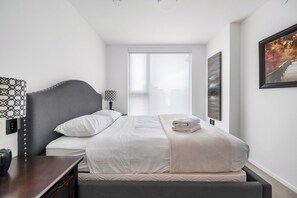 Apartemen Keluarga, 2 kamar tidur | 1 kamar tidur, setrika/meja setrika, dan Wi-Fi gratis