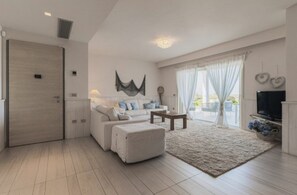 TV - Villa Sfera Blu | 3 Bedrooms | Stunning Sea Views | Infinity Pool & Furnished Terrace with Dining Area | Olbia (Sassari) | Sardinia (Olbia)