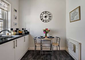 Fridge, microwave, oven, cookware/dishes/utensils