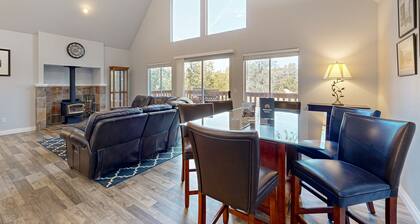 Serene home with spacious deck, fireplace, loft, nearby amenities, dog friendly