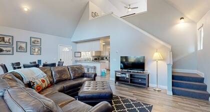 Serene home with spacious deck, fireplace, loft, nearby amenities, dog friendly
