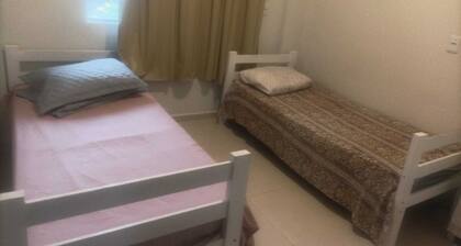 GROUND FLOOR APARTMENT/SEASIDE APARTMENT-COVERED barbecue. Enjoy the place with shower.Lagoon.Dunes