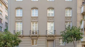 Classic building with a symmetrical facade and evenly spaced windows.