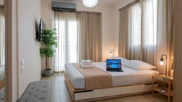 1 bedroom, desk, iron/ironing board, travel crib