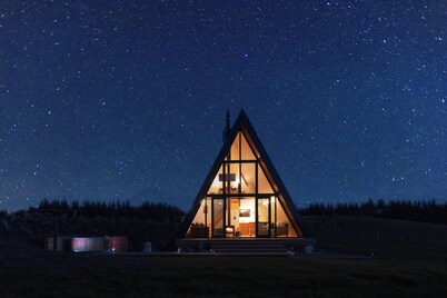 Cozy A Frame Cabin located on a working sheep and beef farm with hot tub