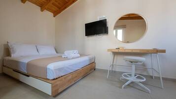 1 bedroom, desk, iron/ironing board, travel crib