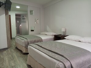 Habitación Deluxe con 2 camas individuales | Wifi gratis y ropa de cama