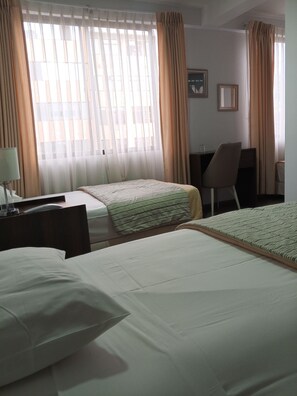 Habitación triple Deluxe | Wifi gratis y ropa de cama