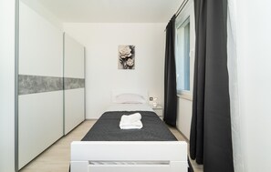 2 quartos, Wi-Fi de cortesia, roupa de cama