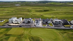 Unclassified image, 2 of 11, button - Housesleeps14-parking-garden-patio-beach (Lahinch)