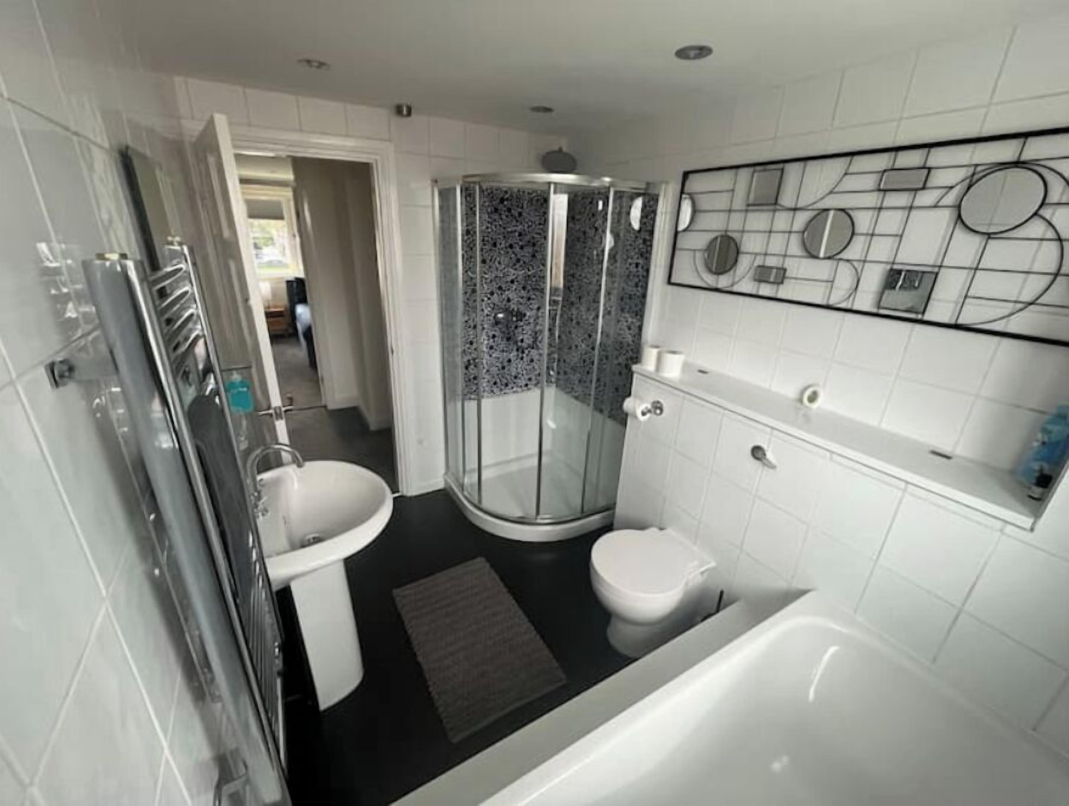 Shower, eco-friendly toiletries, hair dryer, towels