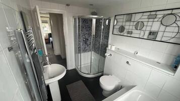 Shower, eco-friendly toiletries, hair dryer, towels