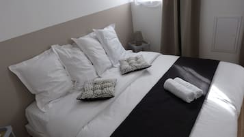 2 slaapkamers, een strijkplank/strijkijzer, reisbedje, gratis wifi